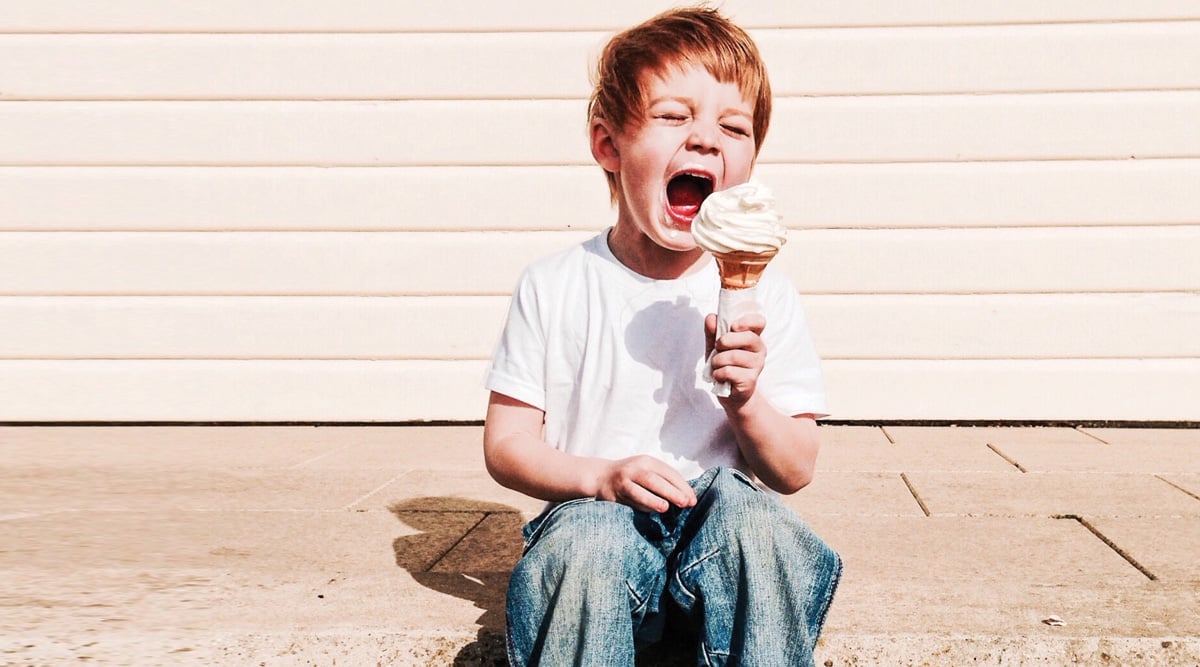 boy eating ice cream cone