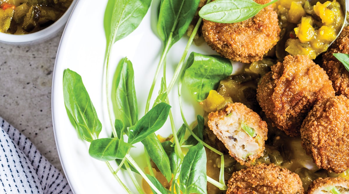 Vegan vegetable meatballs with spinach and green dressing
