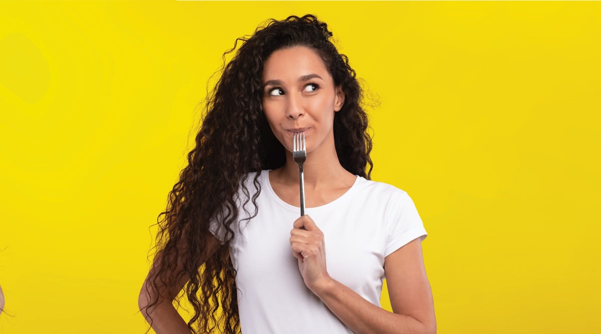 Girl with Fork Tasting something