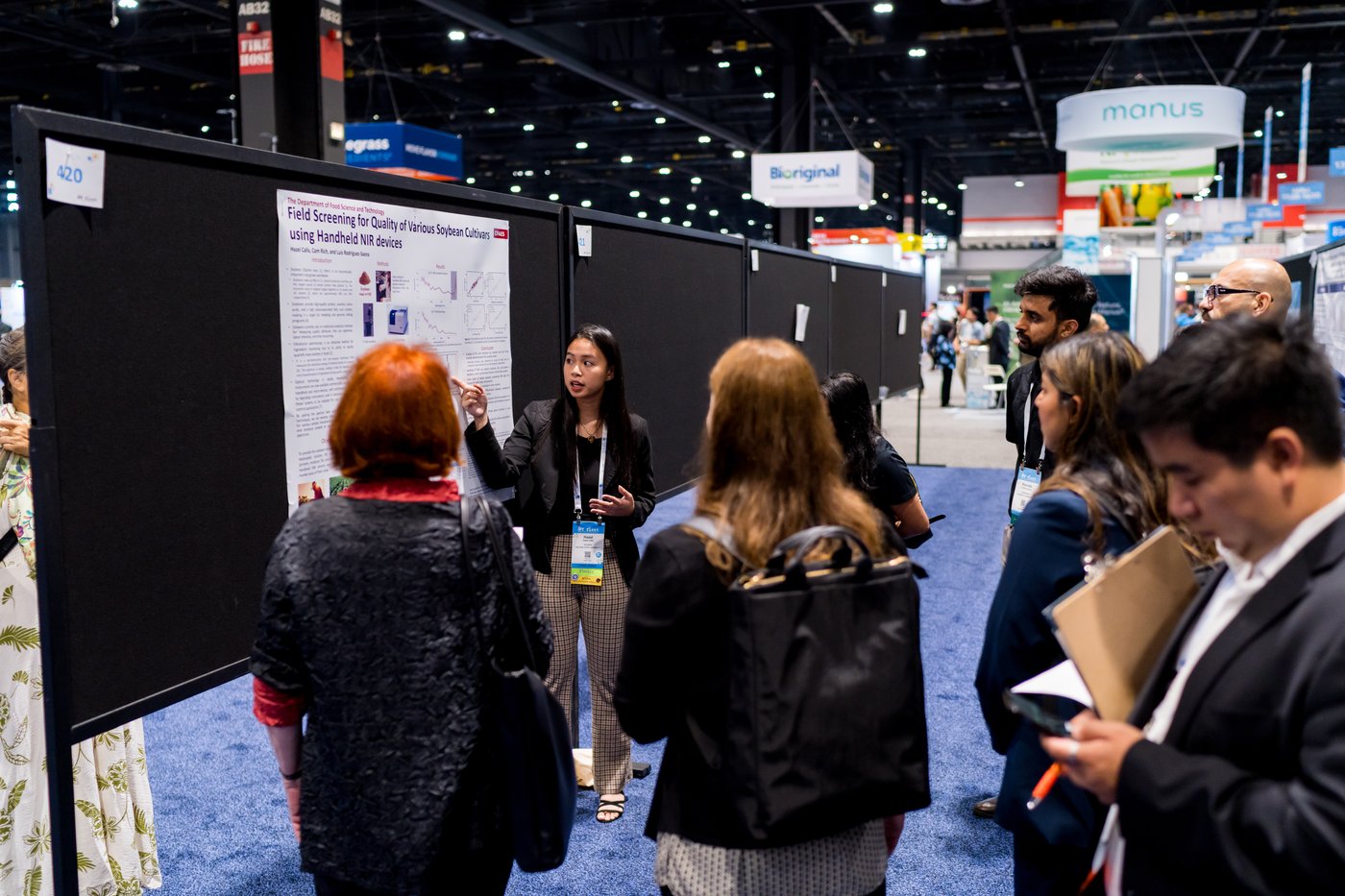 undergraduate student presenting poster