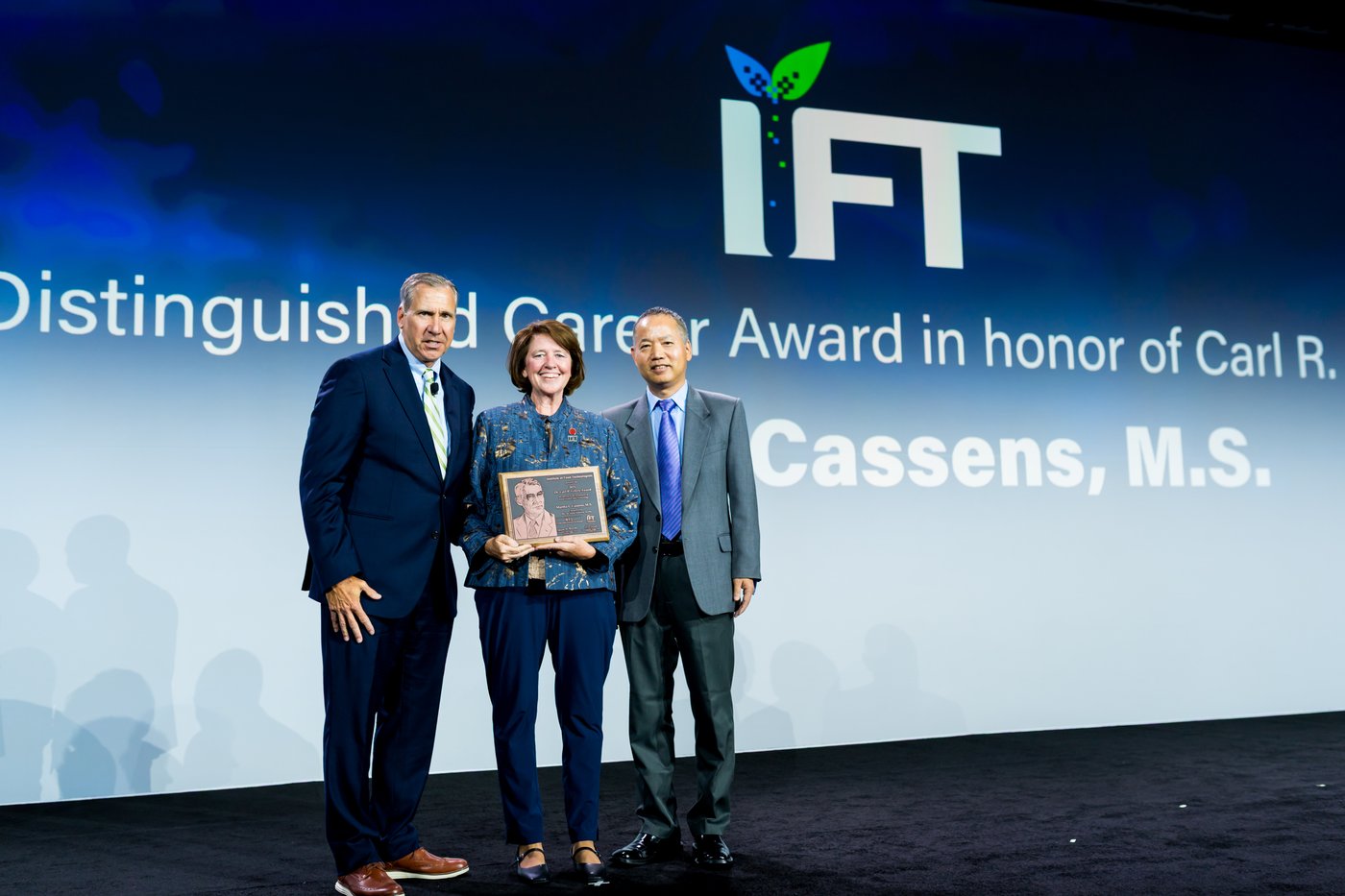 career award winner on stage