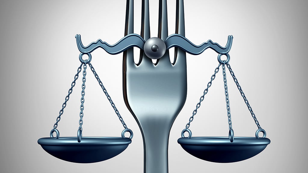 Fork with scales of justice