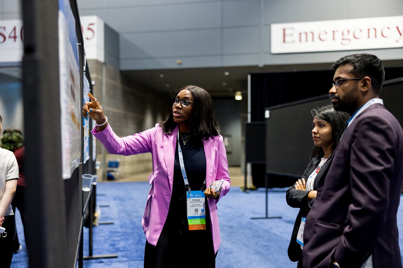 Women Pointing a Poster