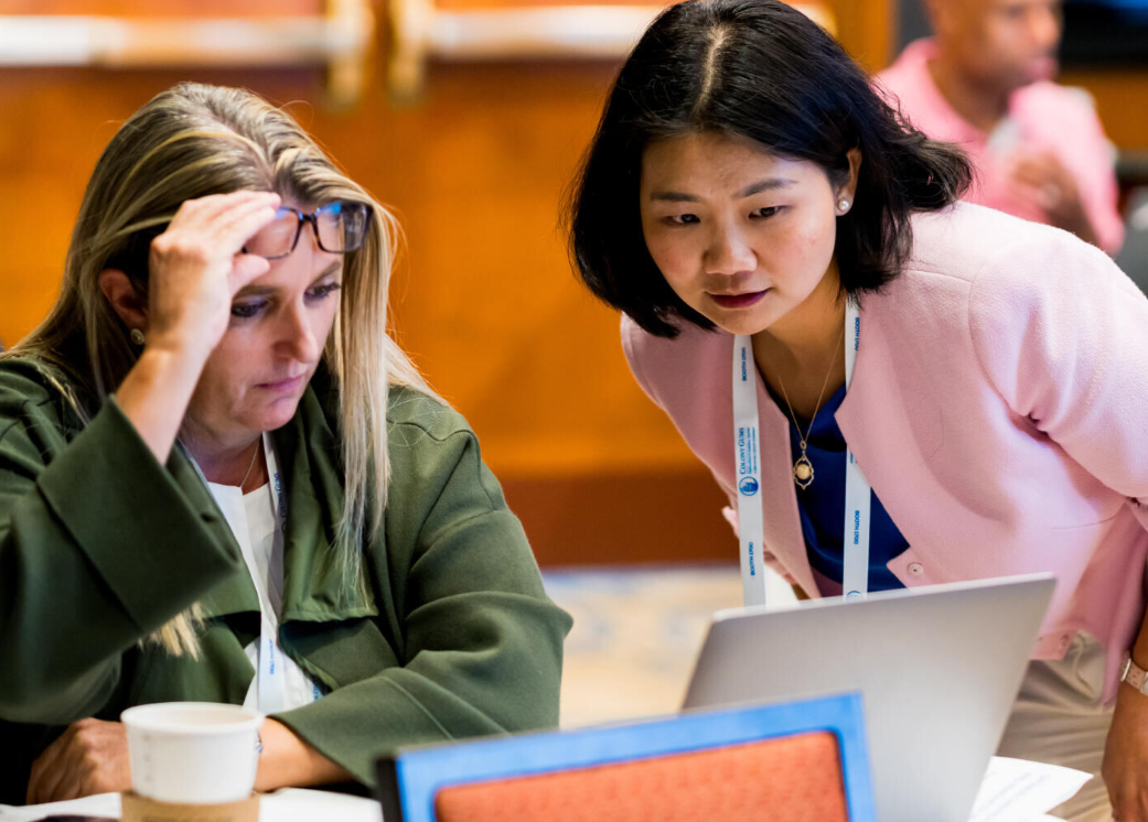 Two Women Looking at Computer Screen