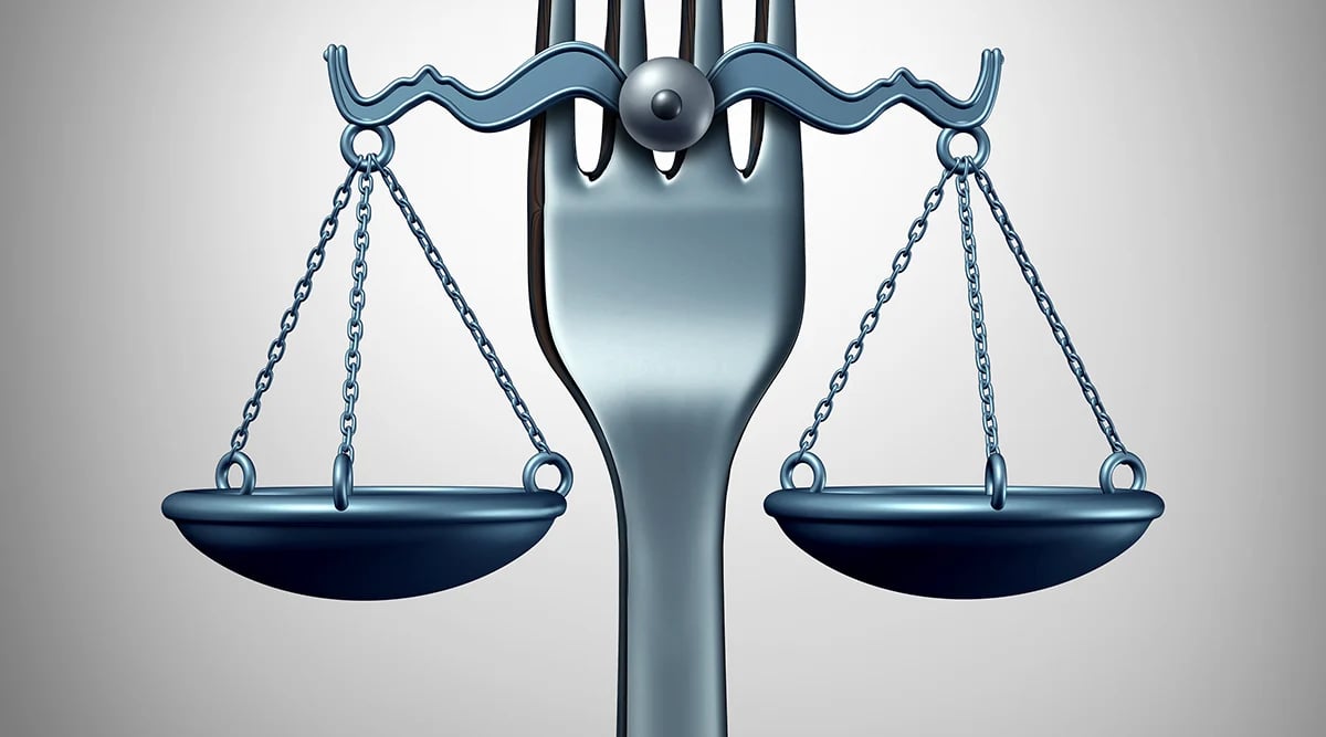 Fork holding scales of justice