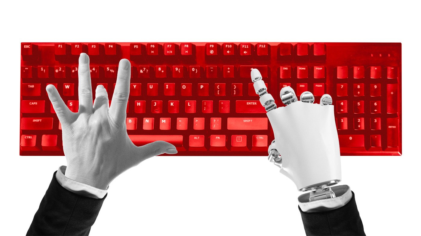 Composition of human and robotic hands typing on red keyboard symbolizing digital cooperation.