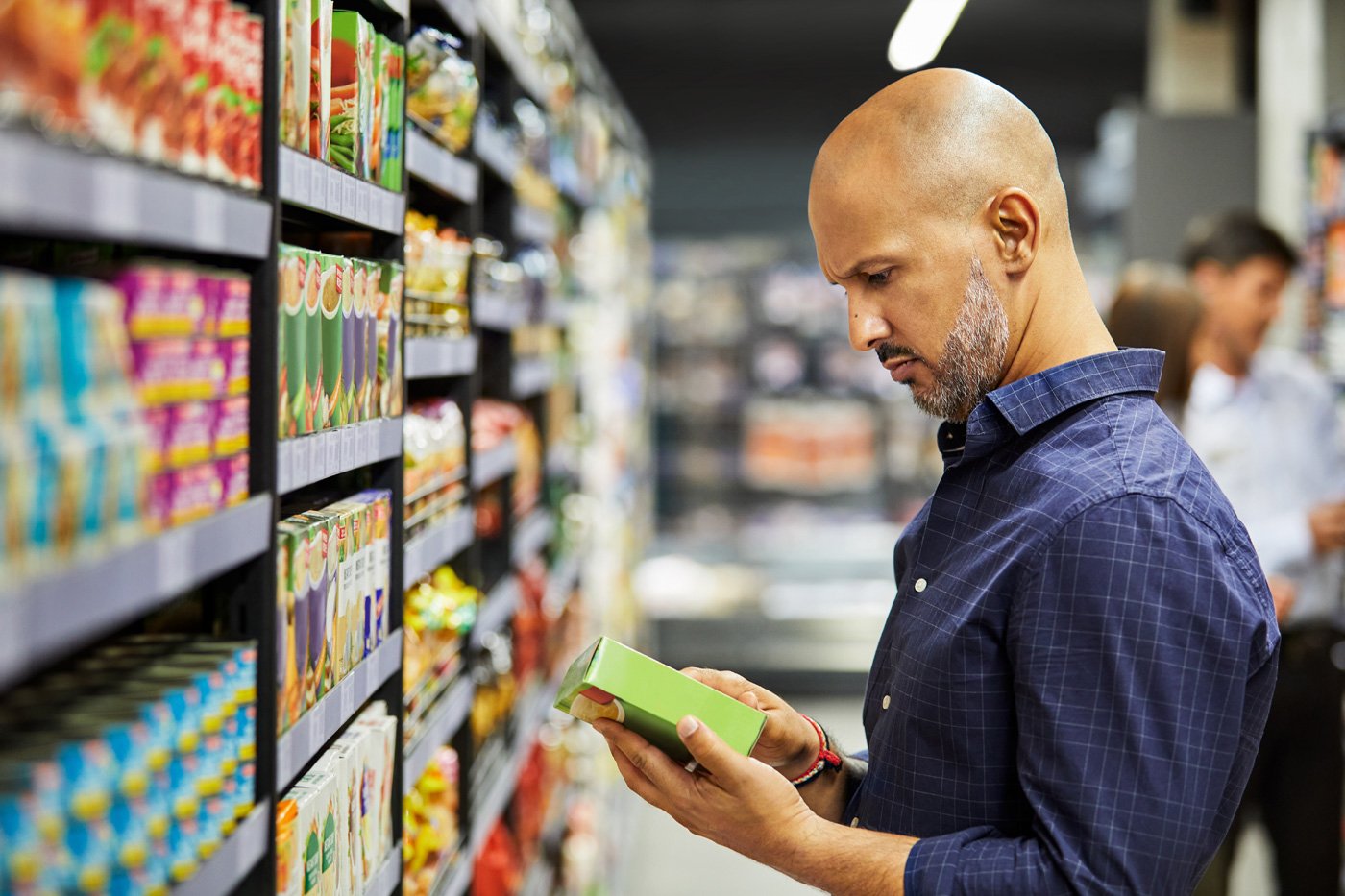 Shopper reviewing ingredient statements