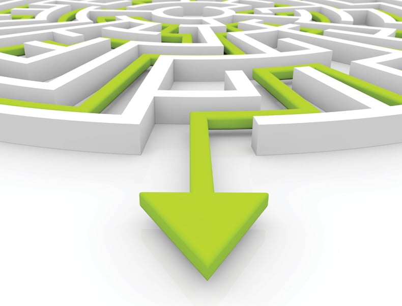 Green arrow path through labyrinth.