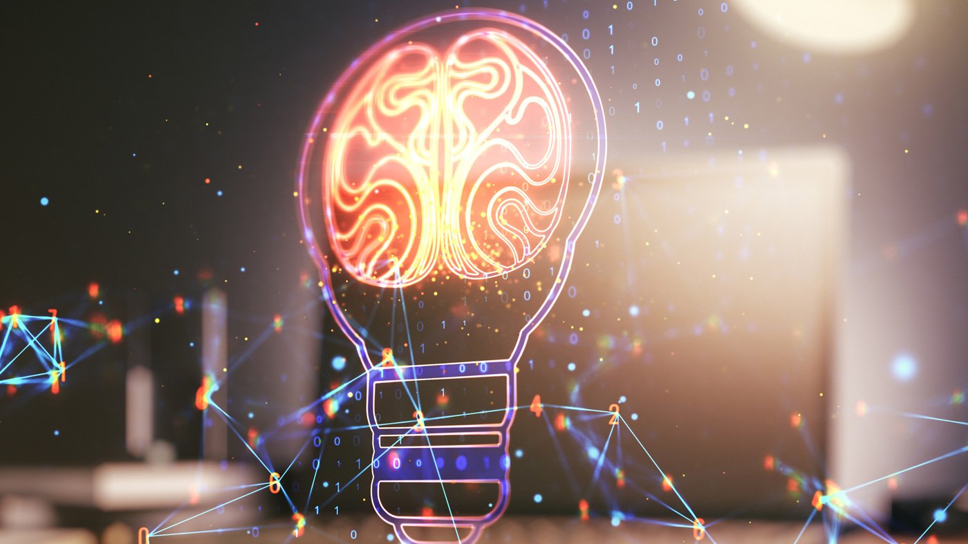 Creative light bulb with human brain hologram on modern laptop background, artificial Intelligence and neural networks concept. Multiexposure.