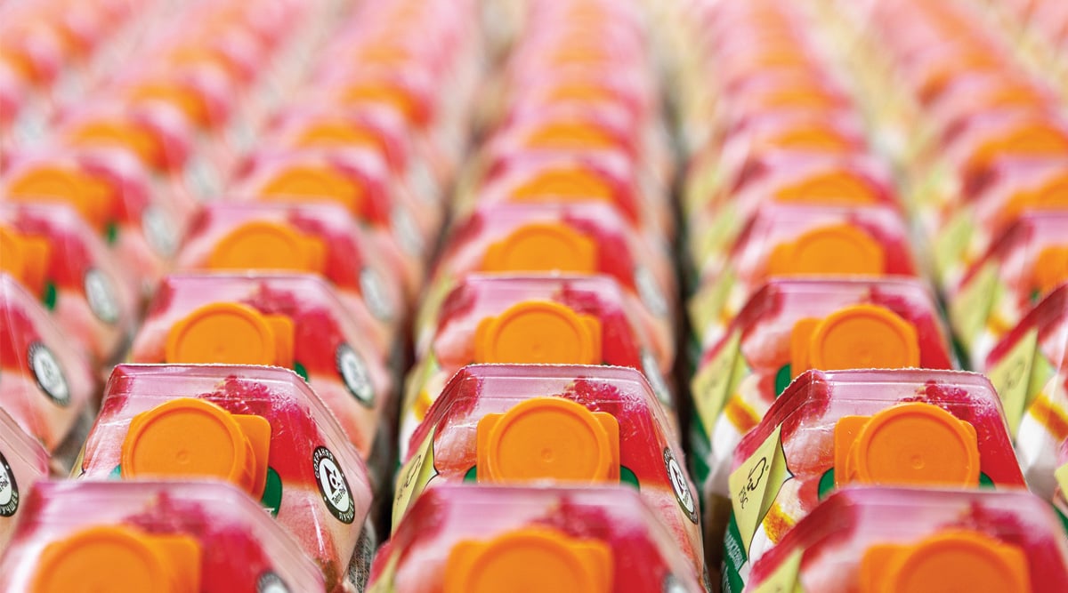 Fruit juices on store shelves in supermarket