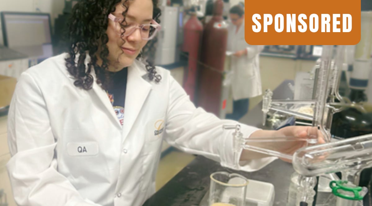 Columbus Vegetable Oils technician tests oil in the lab