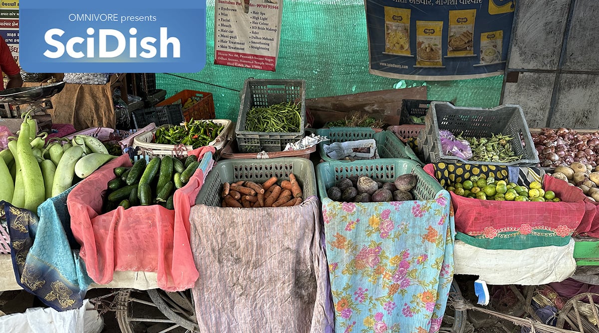 A variety of produce on display at a local outdoor market.