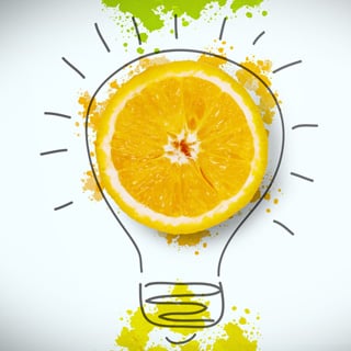 Half of fresh orange on white background