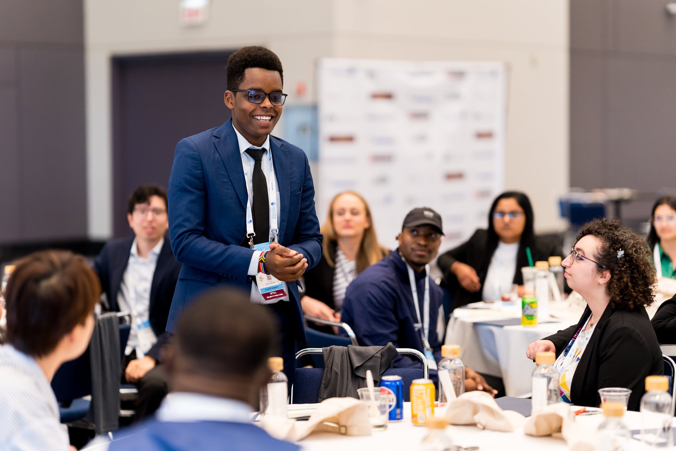 student speaking to group