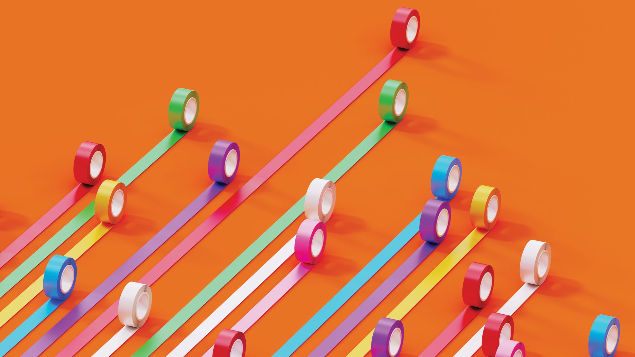 Bar graph made of colorful duct tapes on orange background. Data visualization concept.
