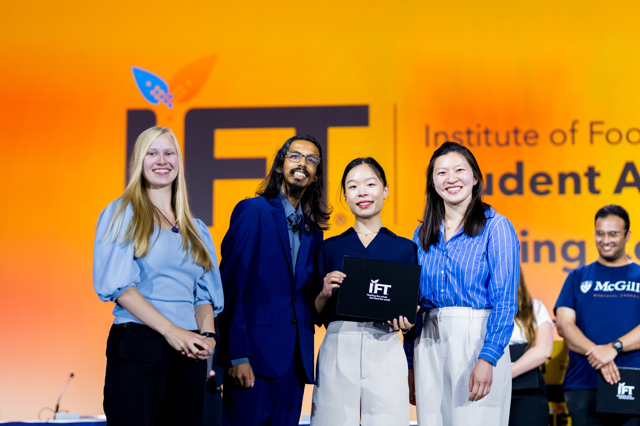 student finalists on stage