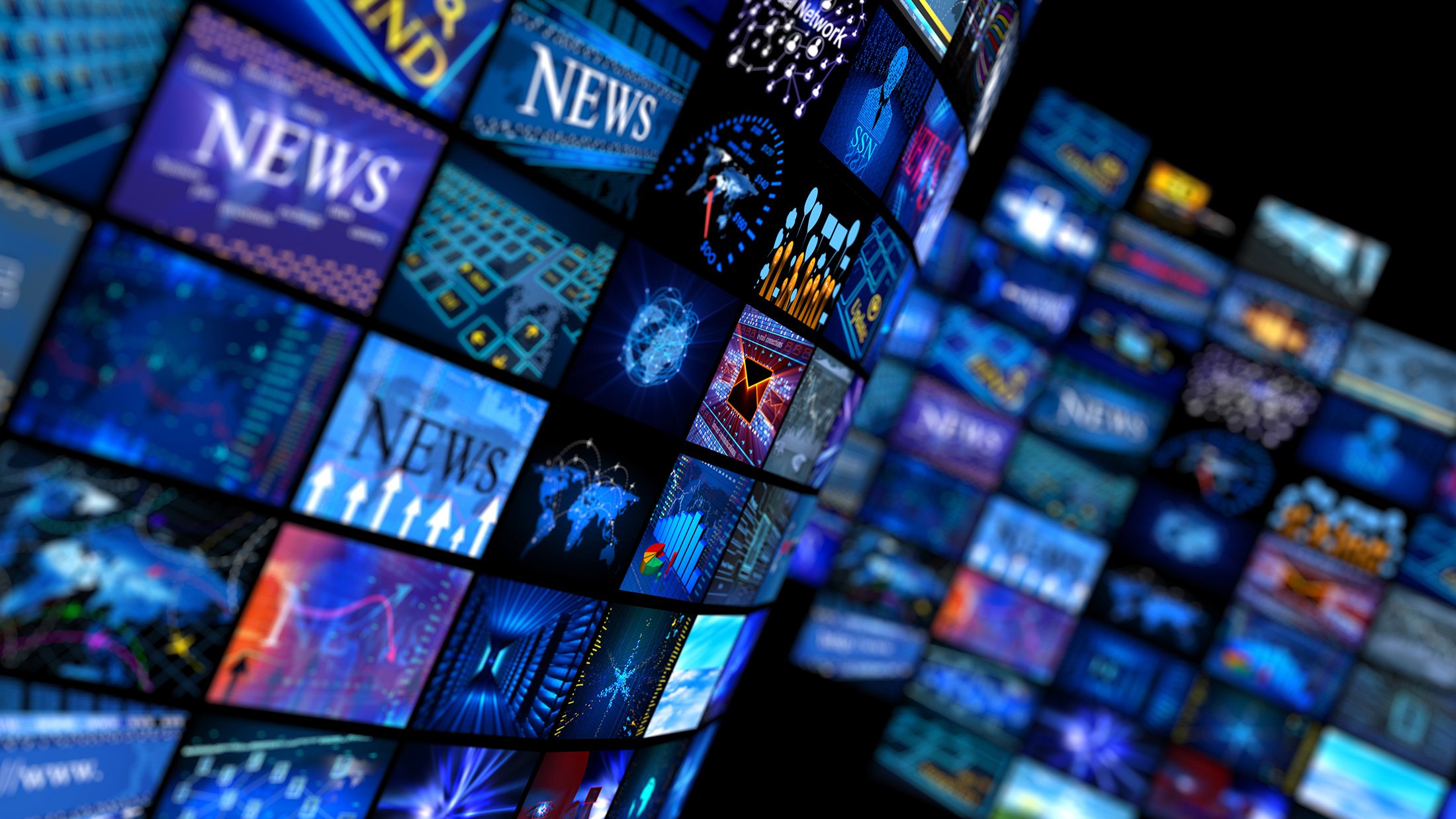 News channels playing on multiple television screens