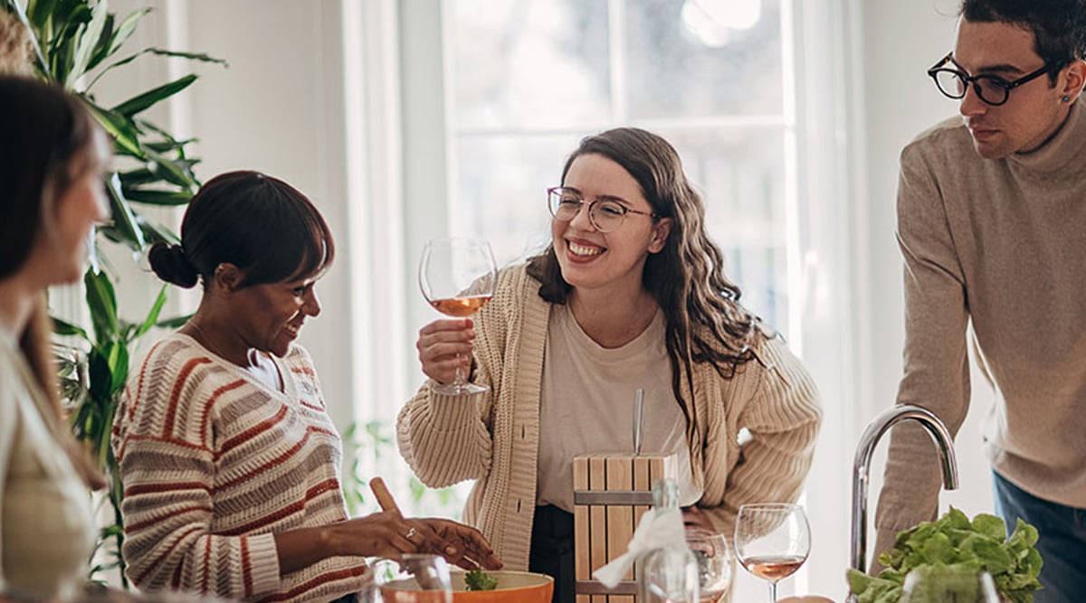 Young people entertaining at home