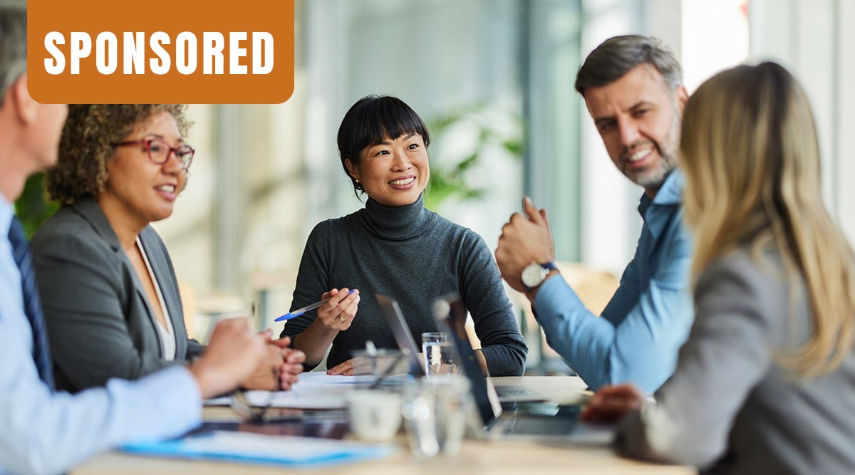 office workers consulting at a conference table