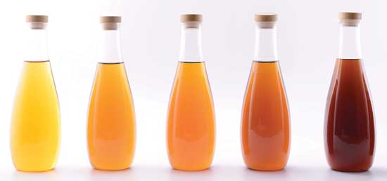 Caramel color and flavor enhancers