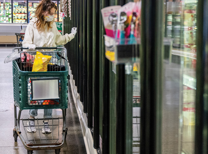 Shopping in Grocery Aisle with Mask and Gloves
