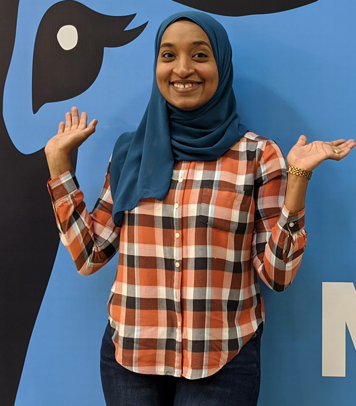 Ghadeer Makki against blue wall