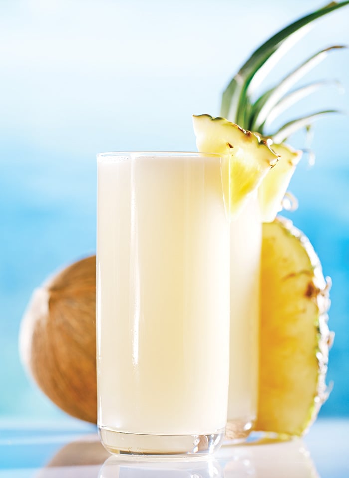 Pina Colada in glass with garnish