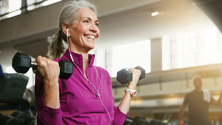 Women exercising in pink shirt