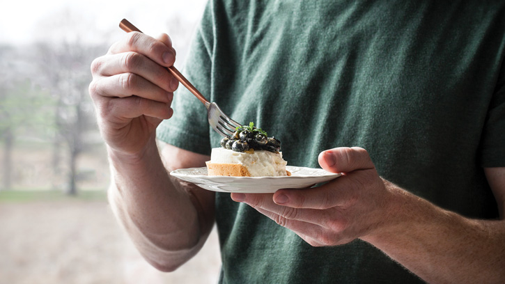 Eating cake on a plate