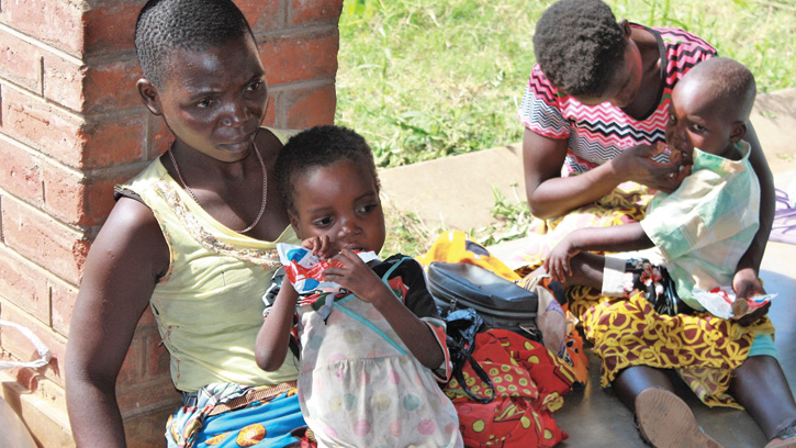 Children participate in a soy-maize-sorghum RUTF pilot program in Malawi conducted by World Vision