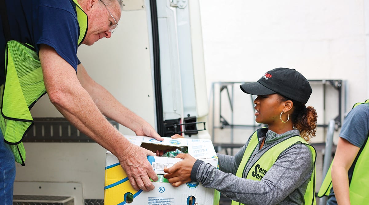 food donations being loaded into a van