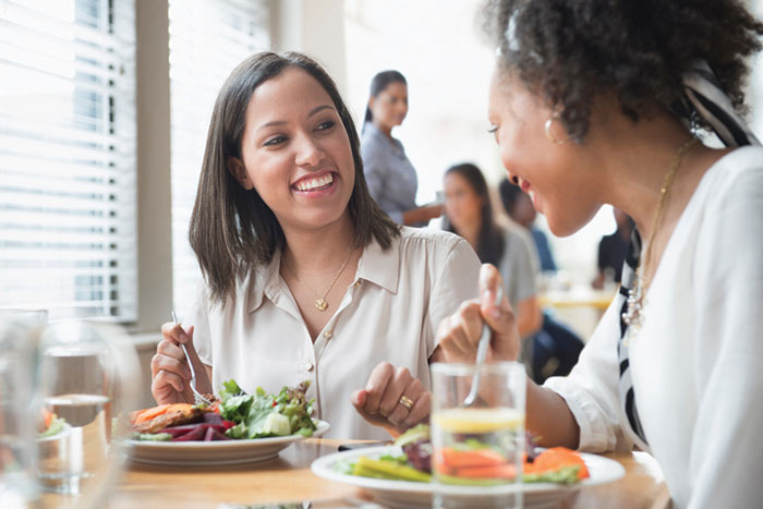 two women eating