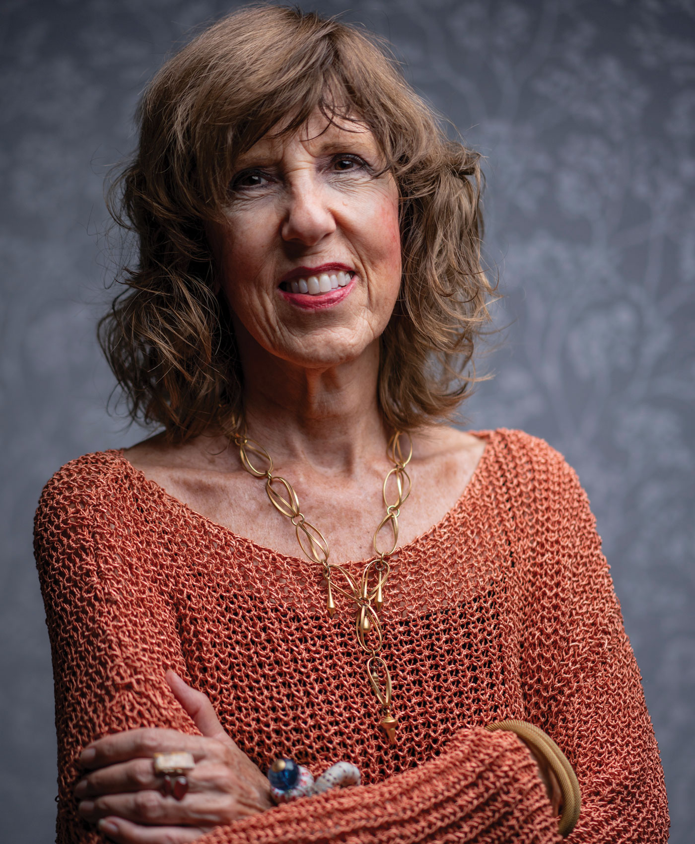 Donna Rosa, arms folded