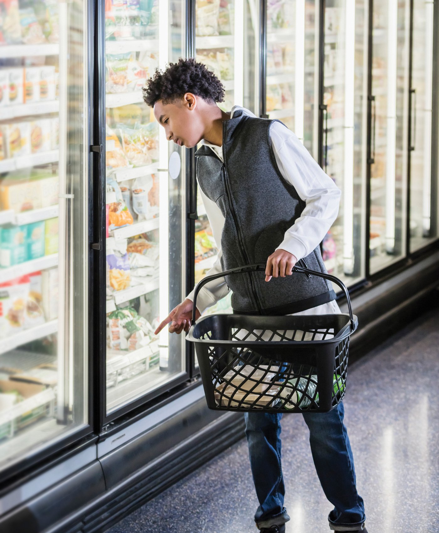 Boy shopping in a grocery store