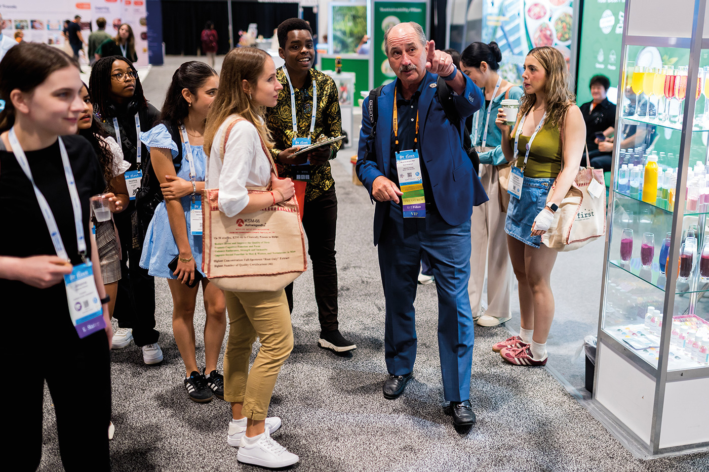 IFTSA members explore the Food Expo with past IFT President Noel Anderson.