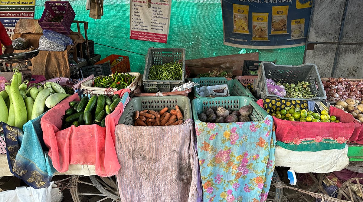 A variety of produce on display at a local outdoor market.