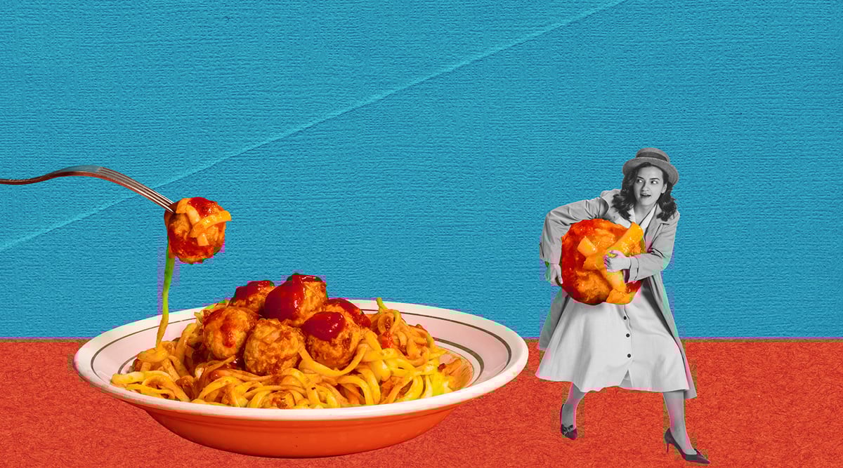 A woman stealing a meatball from a bowl of spaghetti.