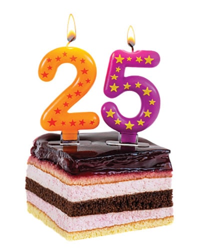 Birthday cake with burning candles for 25th anniversary