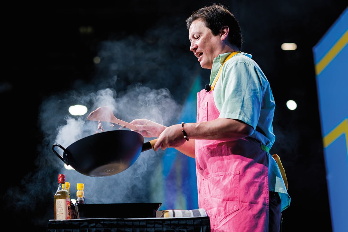 Chef J. Kenji López-Alt preparing mapo tofu in real time on stage.