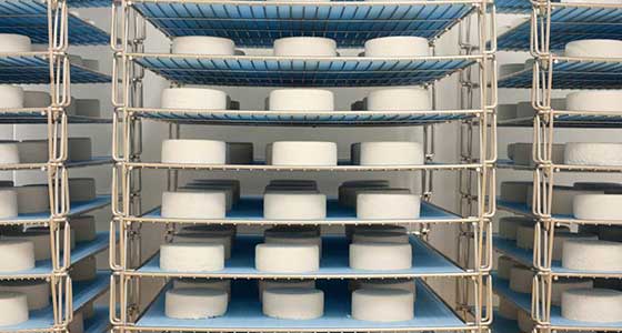 Aging almond milk-based cheese