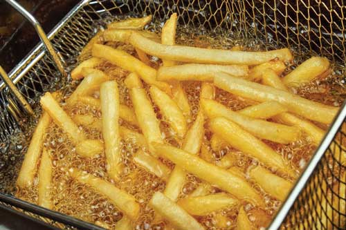 French fries being fried