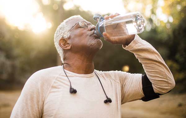 Man drinking beverage.