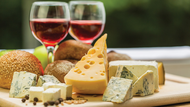 Wine glasses and cheese plate