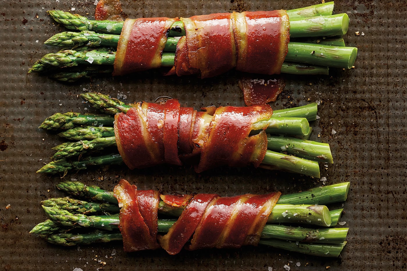 Applewood Smoked Cultivated Bacon from Mission Barns and Asparagus.