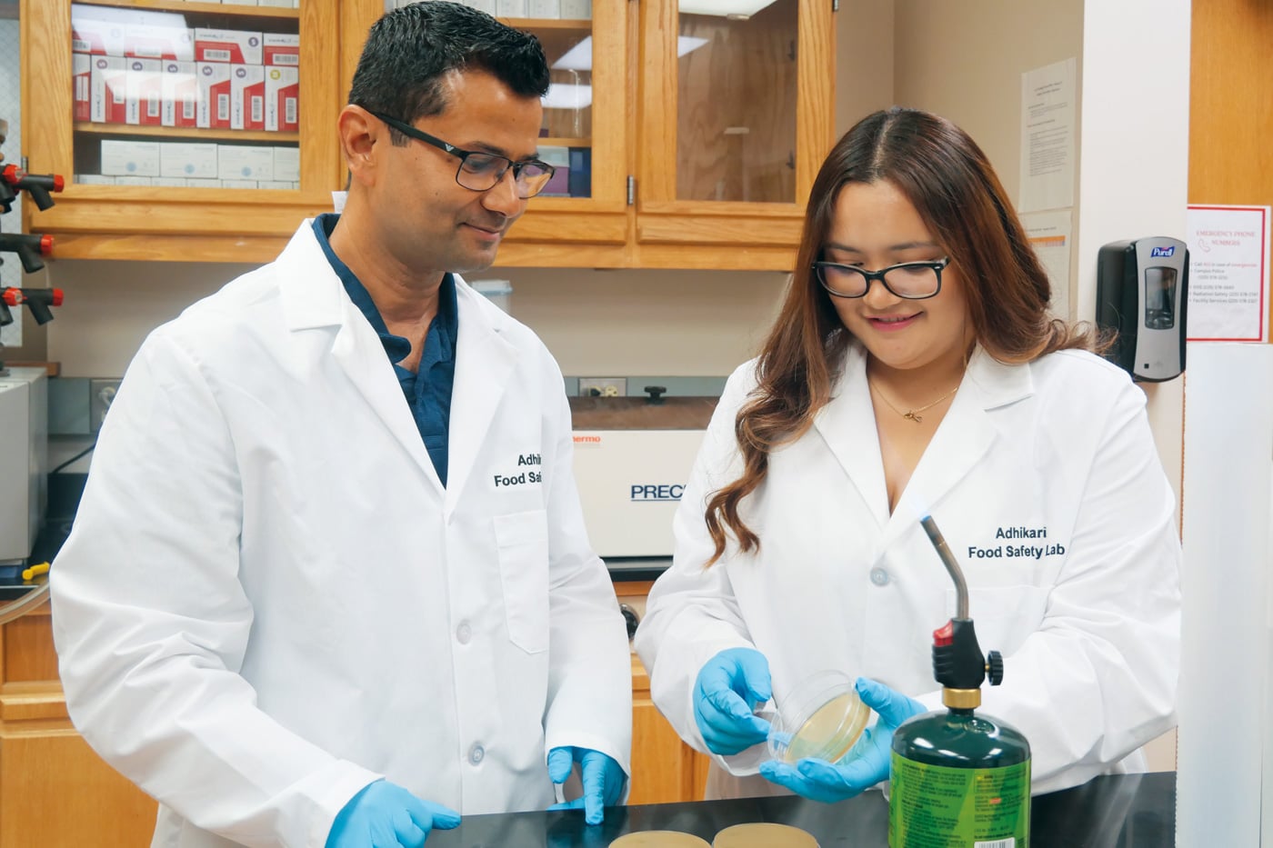 Louisiana State University doctoral student Ivannova Lituma (right) and Associate Professor Achyut Adhikari