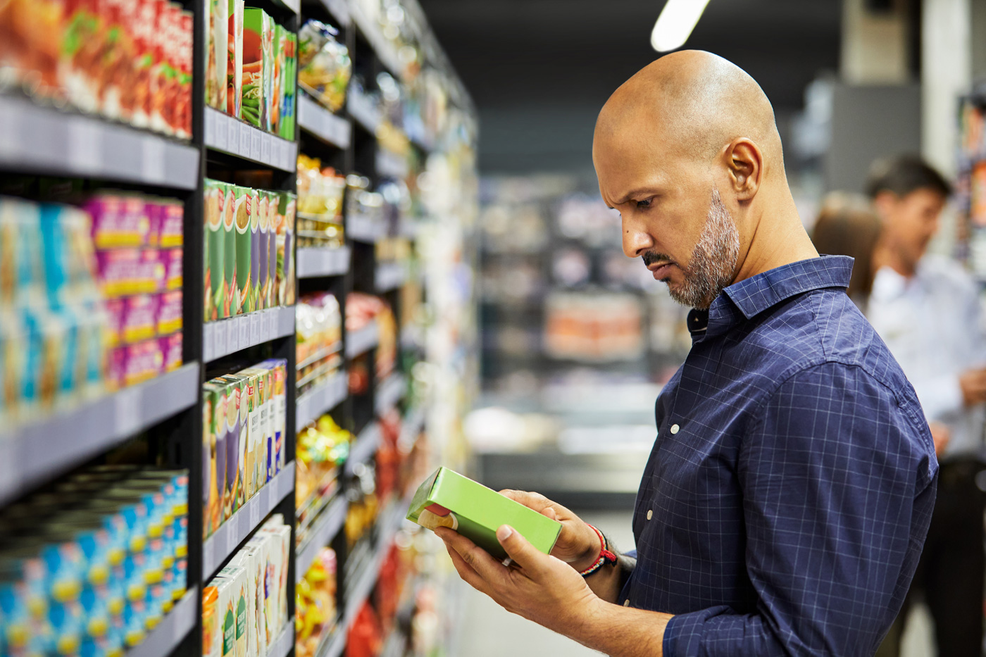 Shopper reviewing ingredient statements